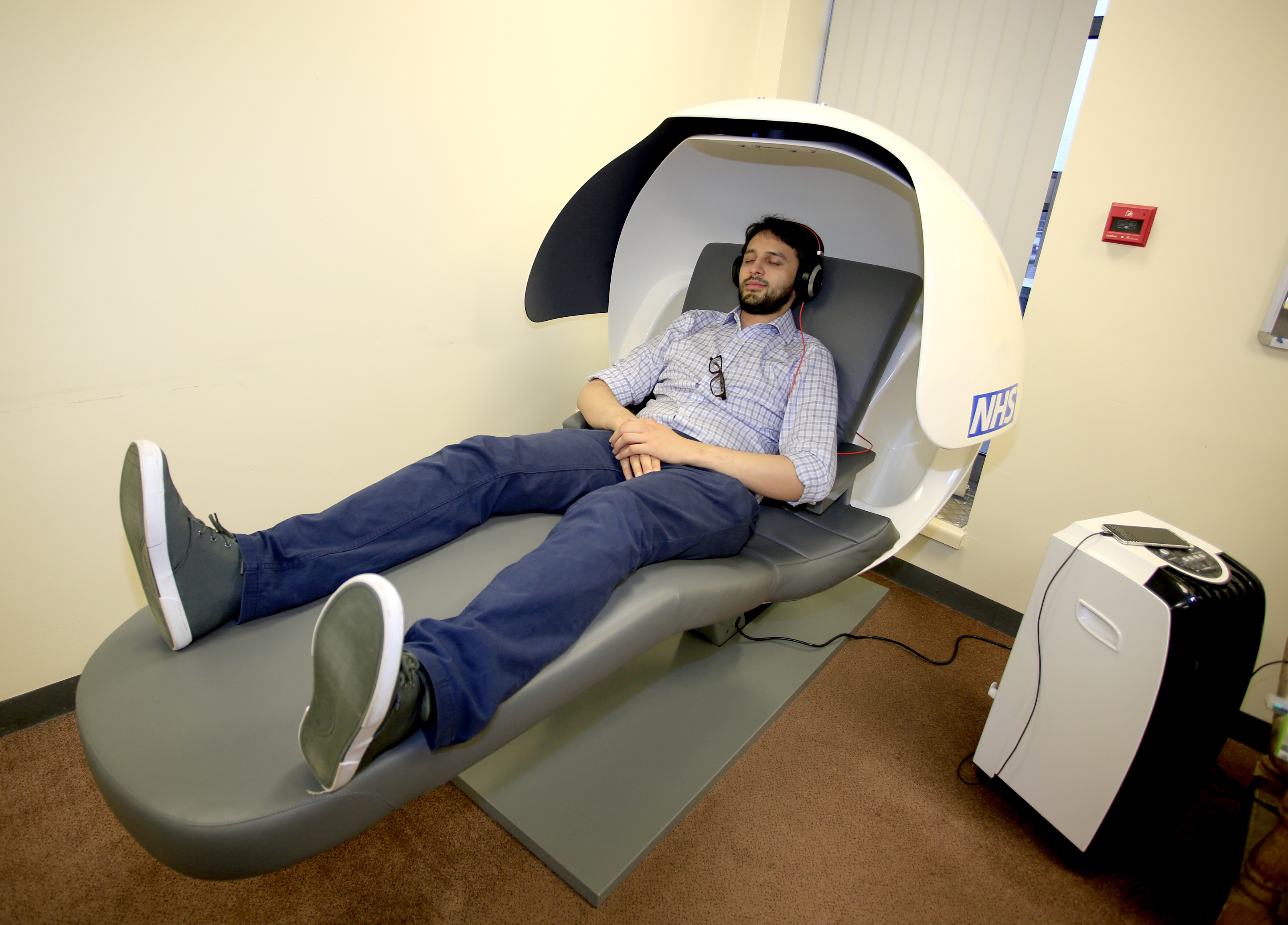 Syed Husain, junior doctor at Wye Valley NHS Trust trying out the sleep pod at Hereford County Hospital.